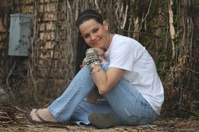 Portrait of posing and smiling woman