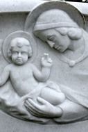 stone sculpture of woman and baby