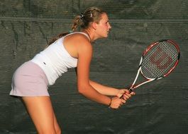 tennis player with a racket in her hand