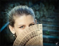 portrait of a girl with a fan