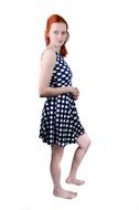 isolated woman in dotted dress