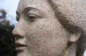 Stone sculpture of woman head