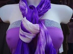 blue scarf around mannequin neck