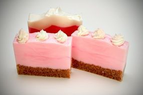 handmade soap in the form of a pink, brown and white cake