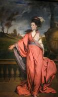 painted woman in red dress on canvas