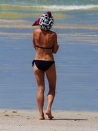 woman in black swimsuit on the beach