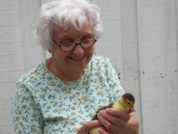 old woman with duck