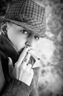 black and white portrait of a smoking woman