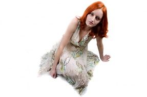 isolated woman with red hair