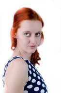 portrait of a red hair woman in dotted dress