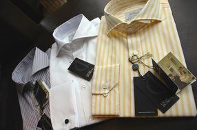 three men's shirts