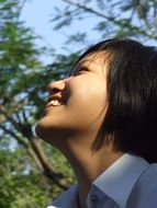 photo of a smiling asian schoolgirl