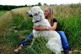 woman and dog on nature