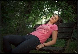 woman on a park bench in a relaxed position