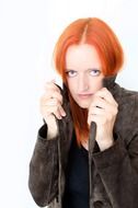 red haired woman in jacket