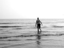 Black and white photo of the woman in the water