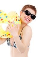 girl in bikini with a beach ball