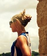 portrait of a girl with pinned hair on the street