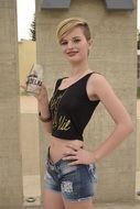 teen girl with glass in hand