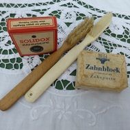 old toothbrushes and toothpaste