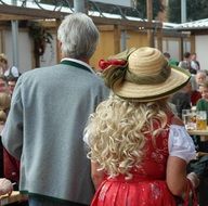 man and woman in traditional costumes in bavaria