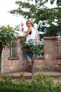 woman in inner garden of a castle