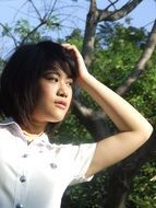 thoughtful asian school girl