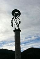 silhouette of a mother Mary on a blue sky