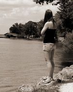 thinking woman on the shore