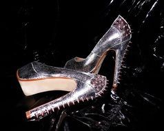 silver high heeled shoes