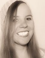 portrait of a smiling girl in sepia color