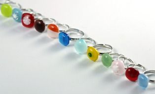 rings with colored stones on the table