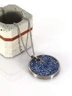 blue pendant on a chain