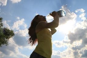 young Girl drinking water