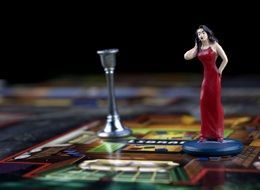 figurine lady in red dress for board game