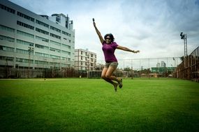 jumping woman with ice cream