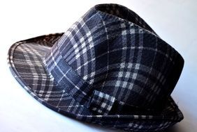 Colorful male checkered hat at white background