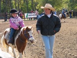 female cowboy - riding coach