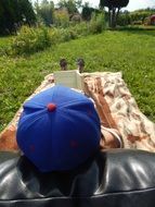 blue cap on the head