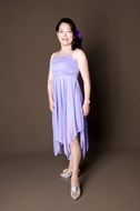 brunette in the purple dress