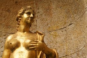 golden woman sculpture