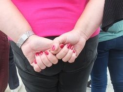 women's hands behind the back