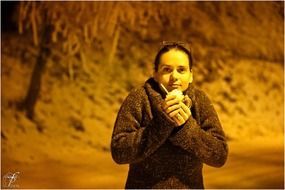 girl with a cup of coffee in the winter