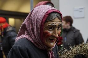 costume of an old woman in headscarf