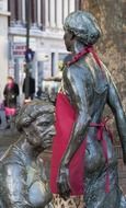 sculpture woman in red apron