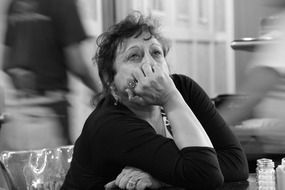 pensive woman in black and white background