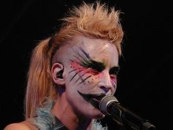 woman makeup singing concert