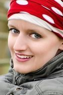 Smiling female with big eyes