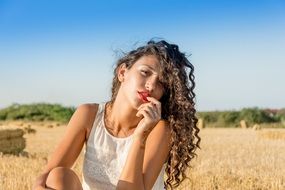Sexy model curly haired woman portrait