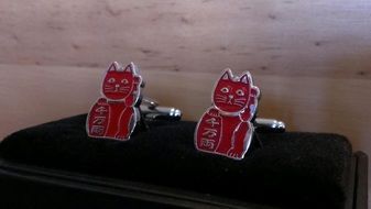 red cat form cufflinks, lucky charm